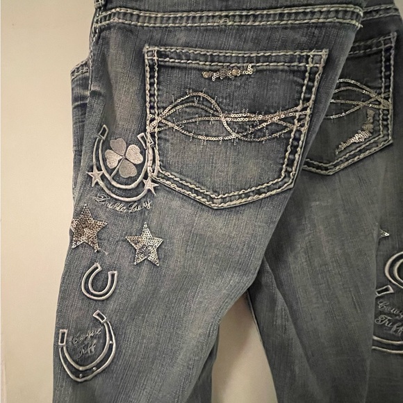 Blue Jeans with Decorative Embellishments and Contrast Stitching - Picture 5 of 10